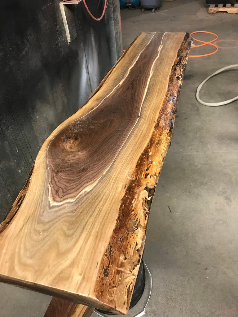 Live edge walnut top and bottom shelf